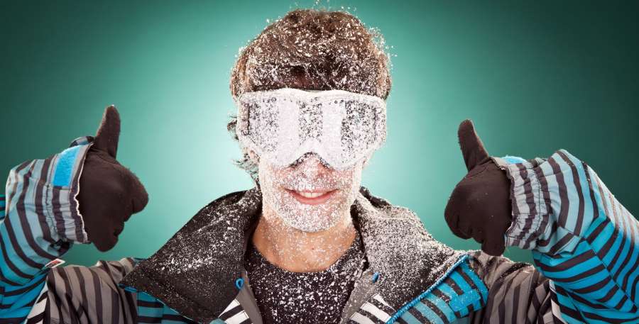 man with snow on his face head and neck man with snow on his face head and neck